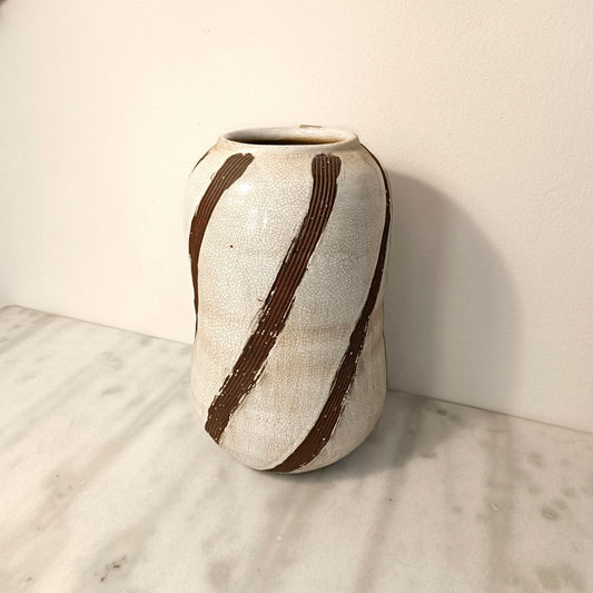 Diagonal striped pot.